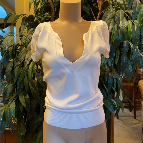 bebe Tops - Bebe ivory top with silk trim and sleeves
